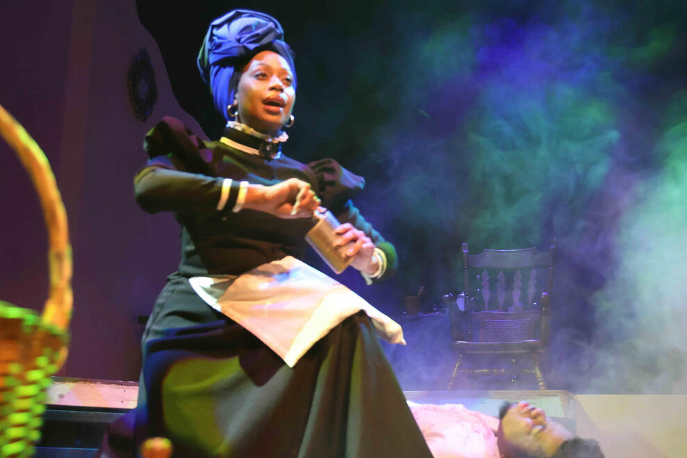 Marie Laveau summons the Ancestors in Cambre's prison cell.